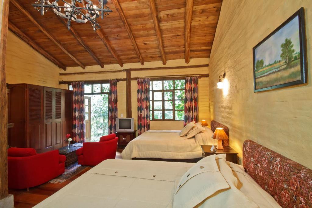 Готель Hacienda La Carriona Sangolqui Номер фото